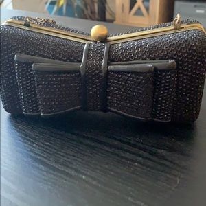Black sequin bow clutch